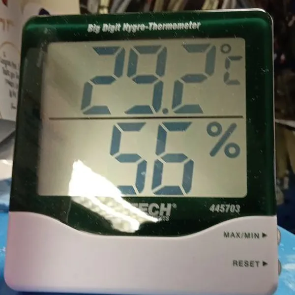 A lab hygro-thermometer reading 29.2 °C and 56% humidity.