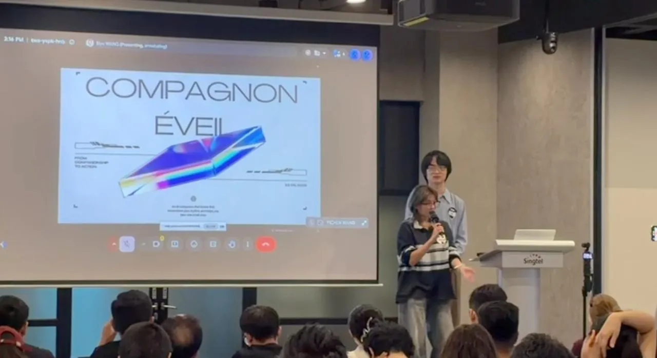 Martina and Siyu Wang on stage at UCWS demo day, presenting Compagnon Éveil to a full room, with the slide “Compagnon Éveil: from companionship to action” behind them.